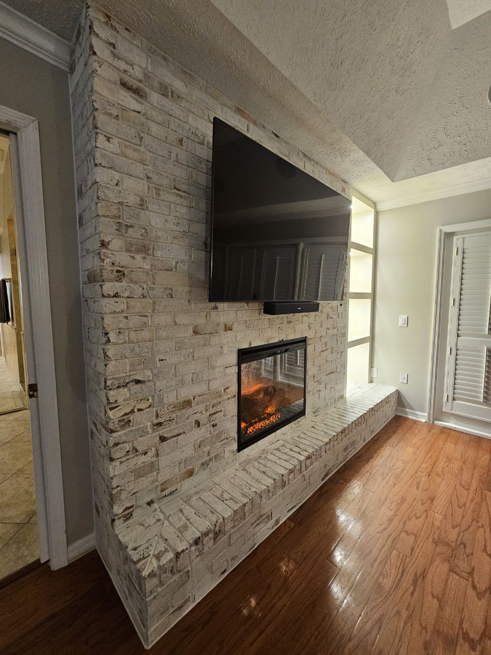 Brick Fireplace with Bookcase